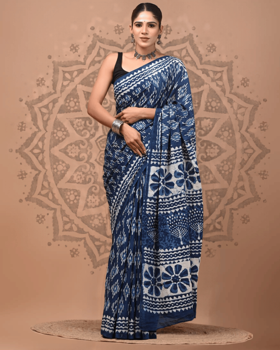 Indigo-blue Mul Cotton ready-to-wear pocket saree with ivory wave borders, scattered dash motifs, oversized floral panels and a tree motif on the pallu.
