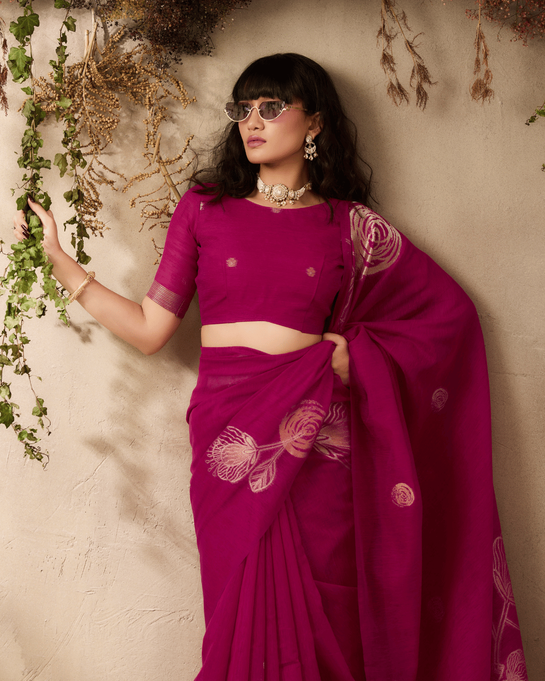 Rich berry-magenta silk ready to wear pocket saree featuring floral motifs.