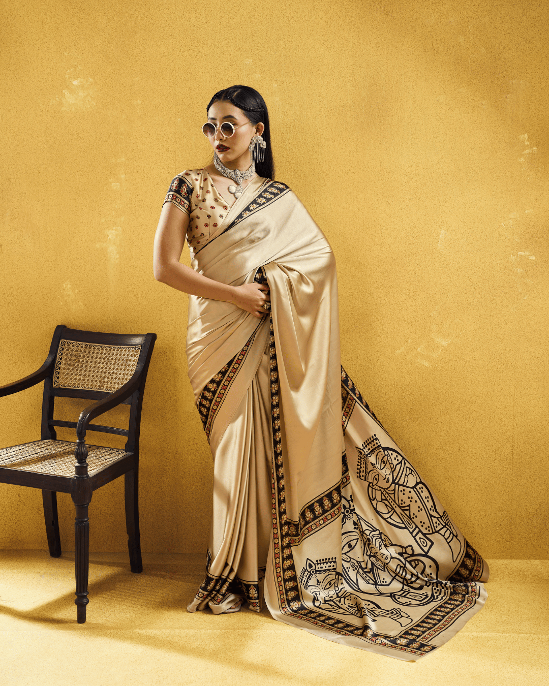 Full-length portrait of the neat pleating and open pallu fall of the ready to wear pocket saree.