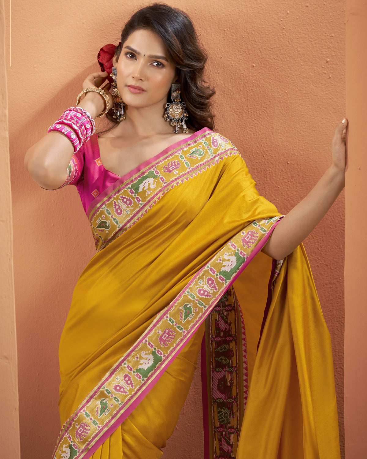 Mustard yellow Patola Silk ready to wear pocket saree with multicoloured patterned border