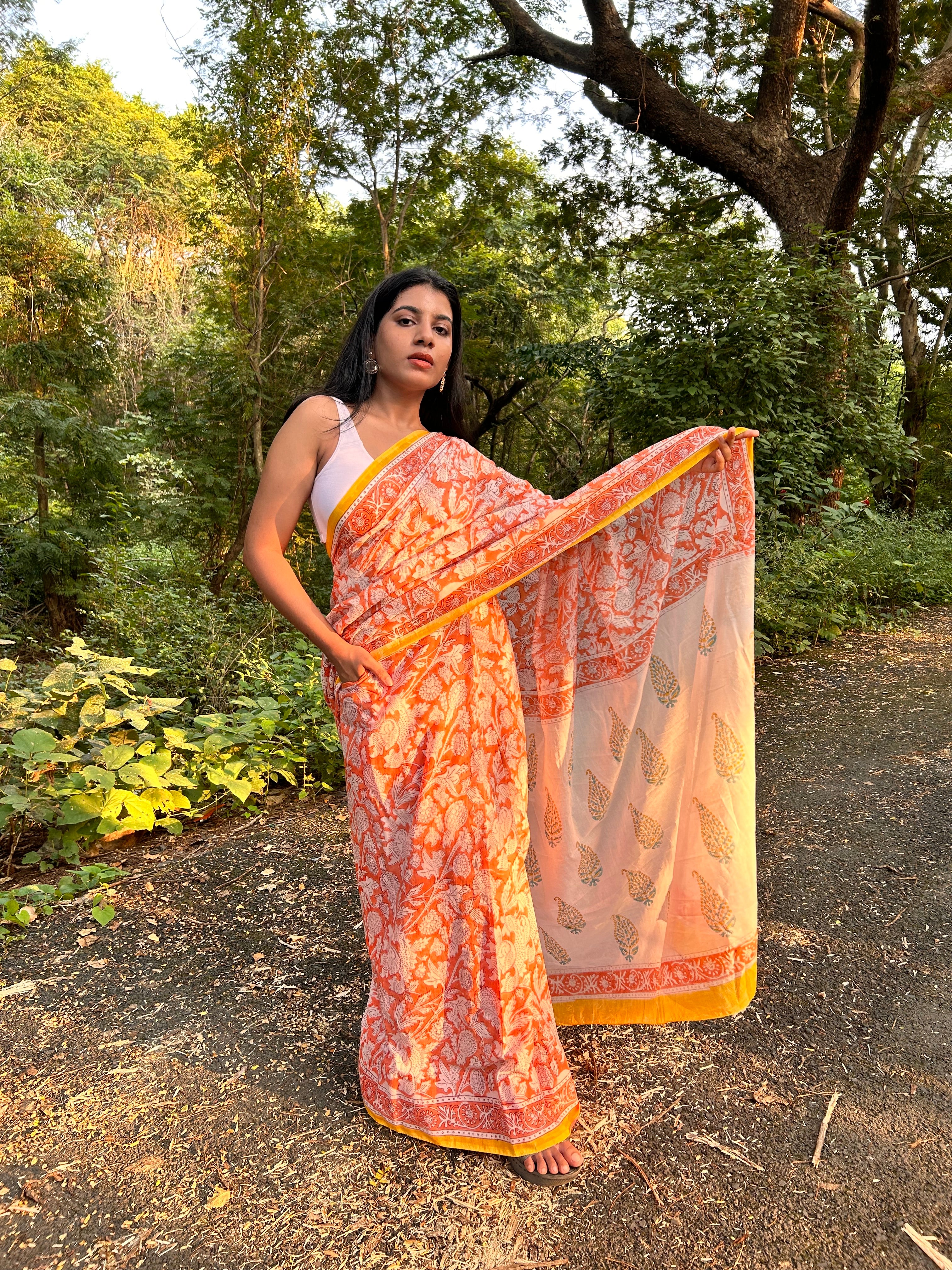 Vibrant in orange Mul Cotton Hand Block Printed Saree