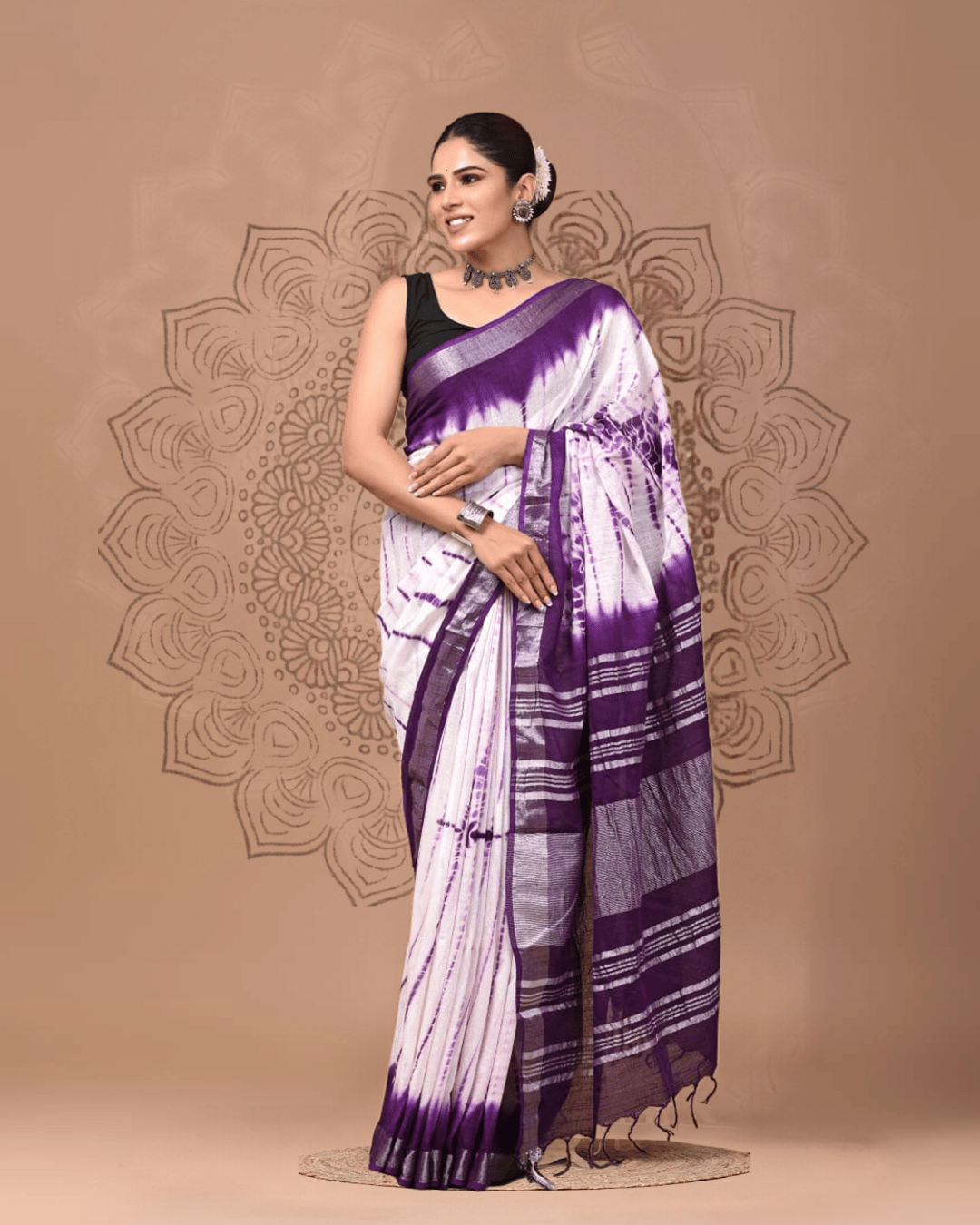 Elara Linen ready to wear pocket saree featuring tie dye and shades of purple and white with horizontal silver stripes along the pallu and borders.