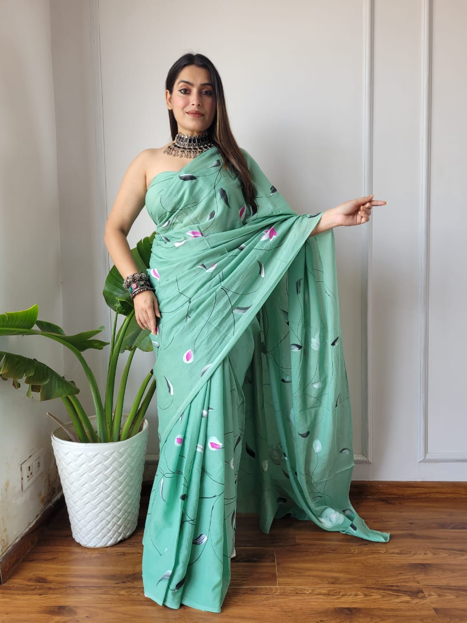 Mint green floral drift ready to wear pocket saree with floral details