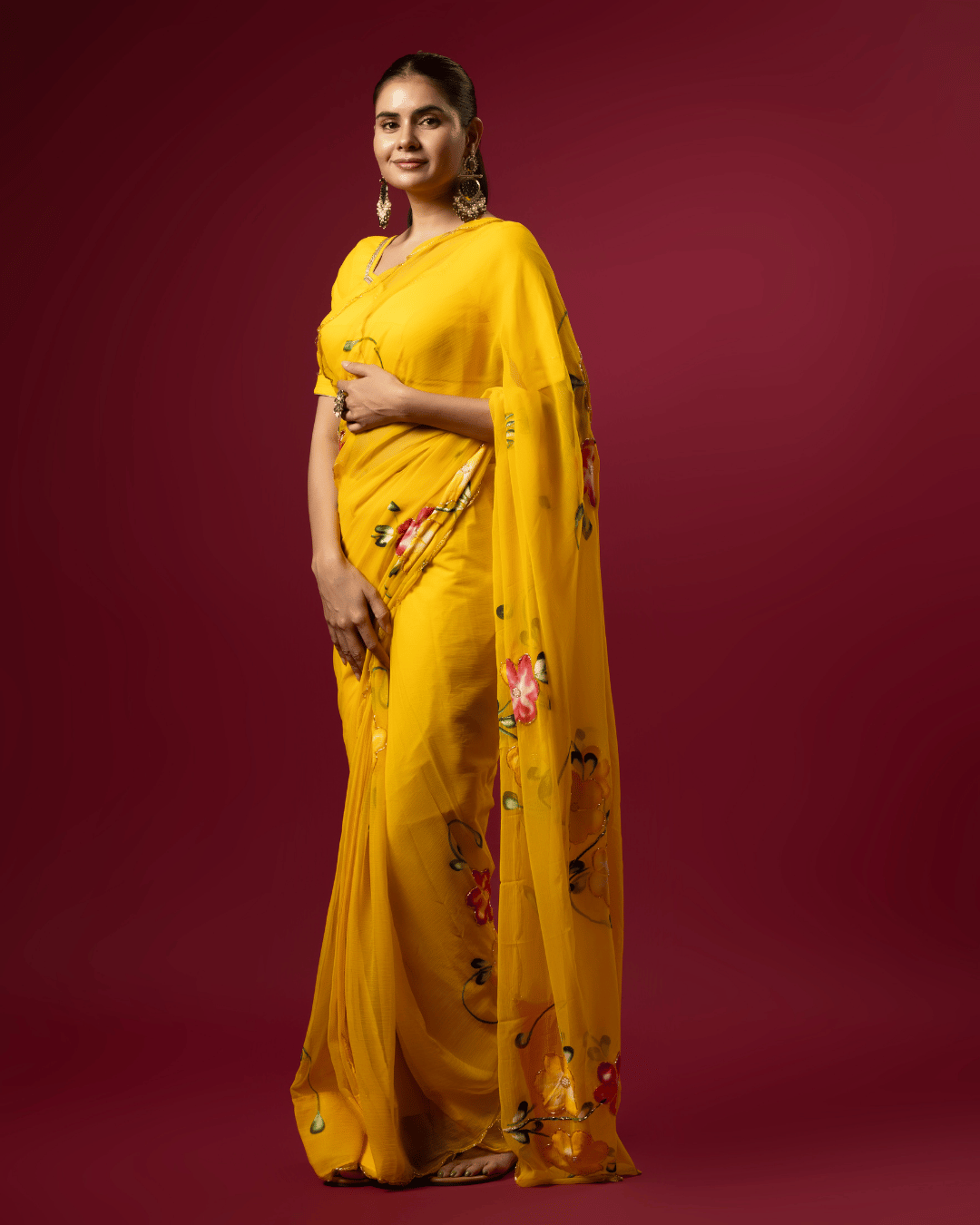 Side pallu shot highlighting the pink and yellow floral details of the fresh floral grace chiffon ready to wear pocket saree.