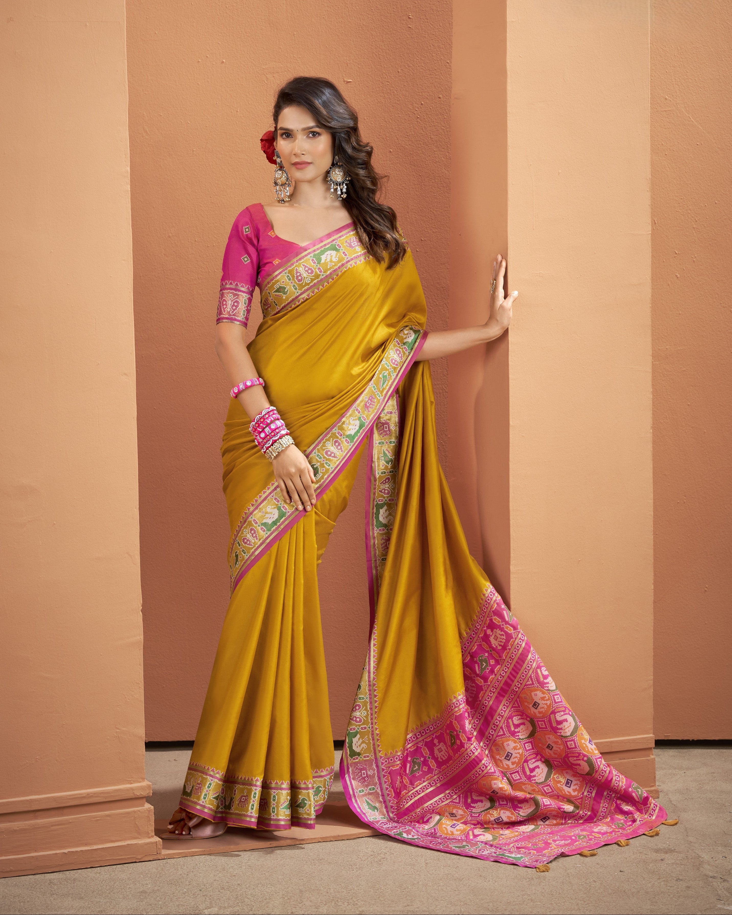 Mustard yellow and pink ready-to-wear pocket saree with intricate multicolor border and pallu