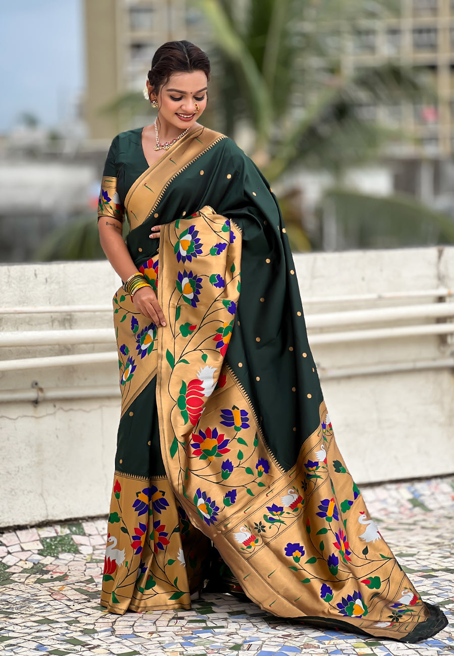 Full-length view of a deep green ready-to-wear Paithani pocket saree featuring pre-arranged pleats and an intricate gold floral pallu.