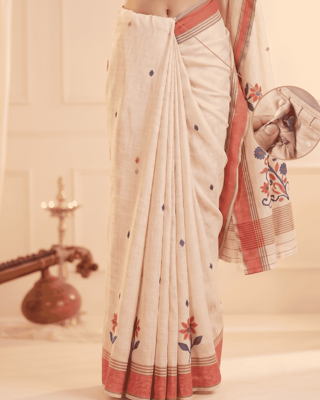 Close up of the hook and loop closure and the seamless waistbad of ivory linen pre-draped saree with pocket