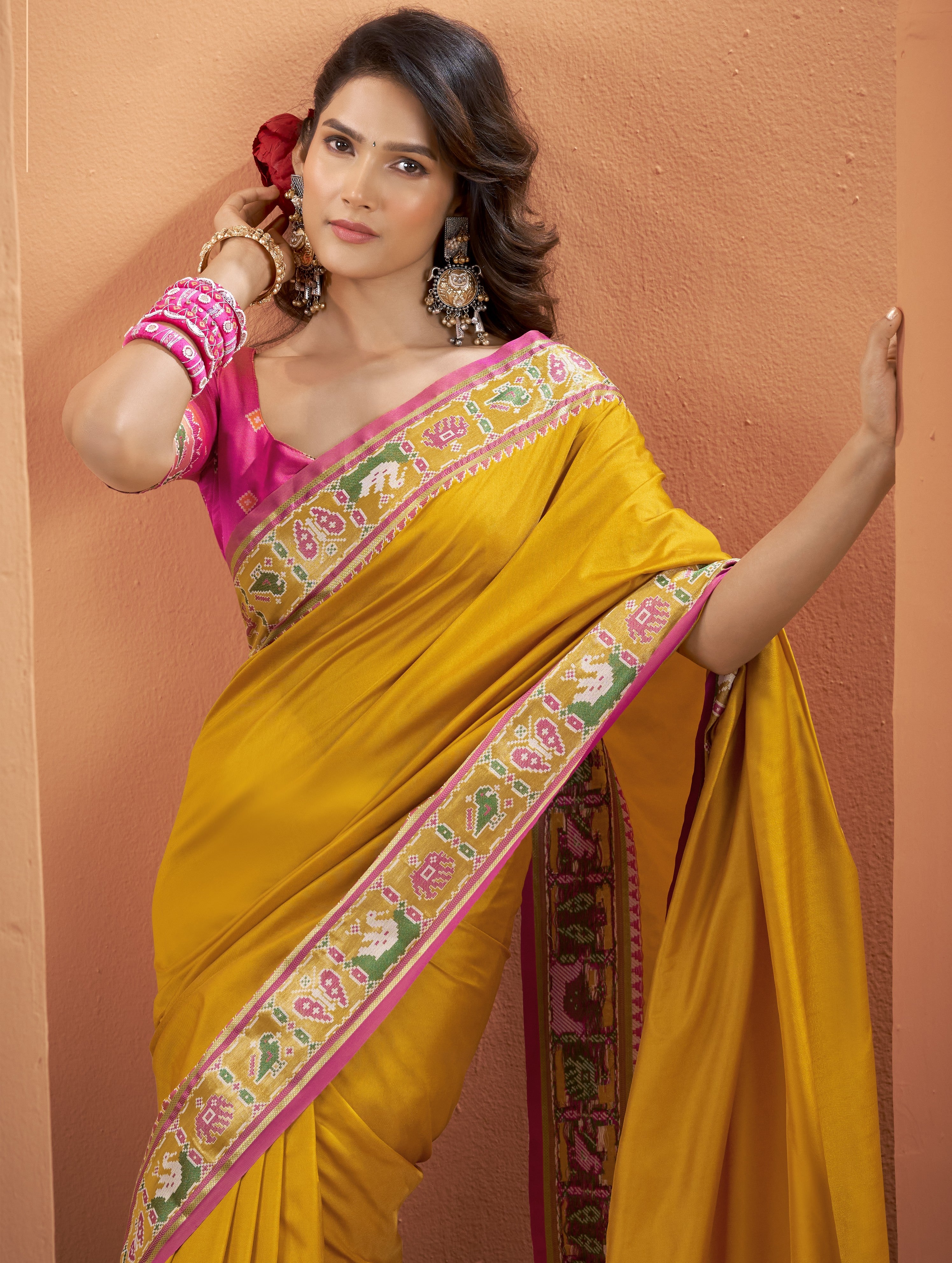 Mustard yellow Patola Silk ready to wear pocket saree with multicoloured patterned border